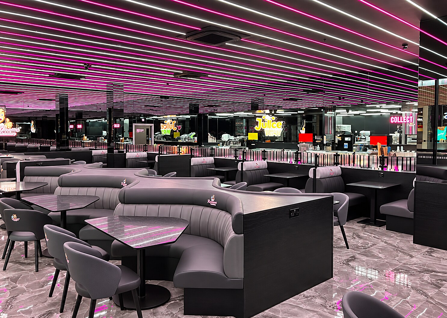 Completed seating and LED ceiling inside Rassam's Creamery